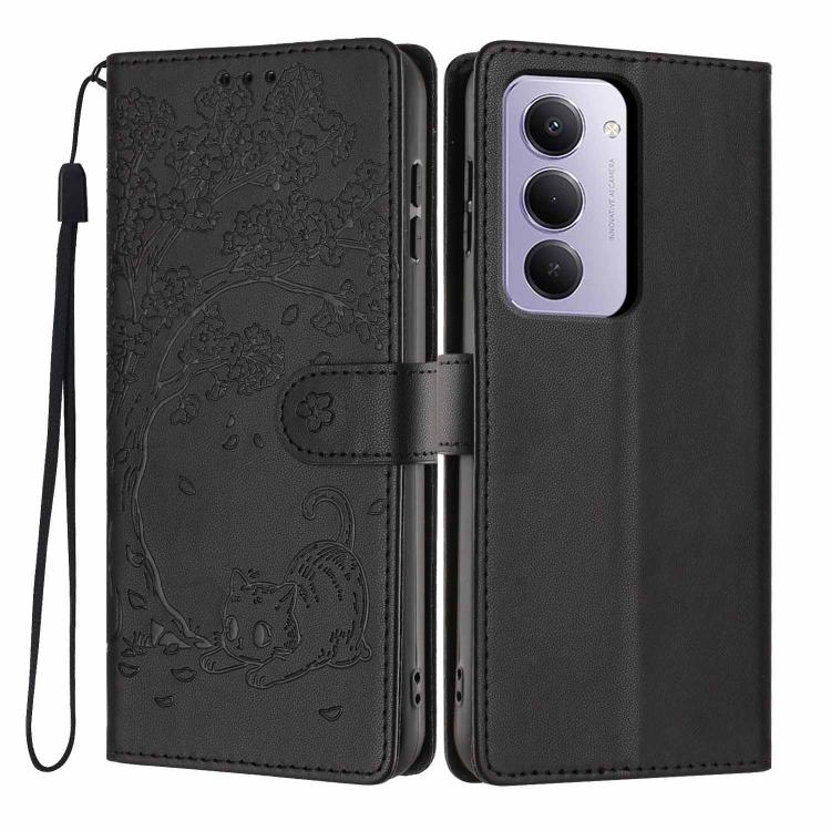 Black embossed flip vegan leather phone case with cat tree design and wrist strap.