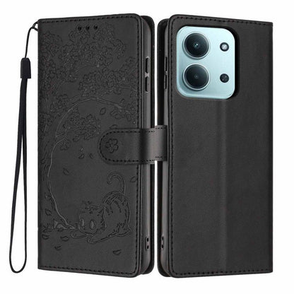 Black embossed cat flip phone case with magnetic strap and wrist lanyard.