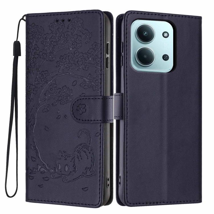 Dark blue embossed cat flip phone case with magnetic strap and wrist lanyard.