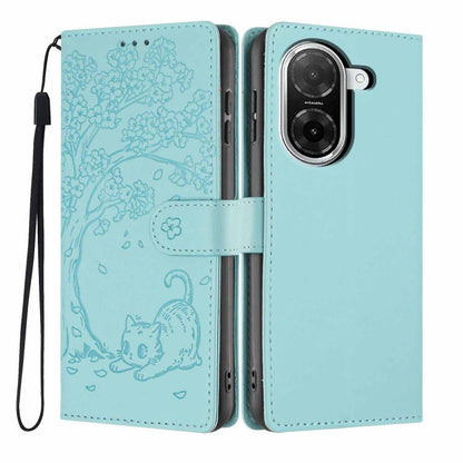 Light blue flip phone case with embossed cat scene, card slot, and wrist strap