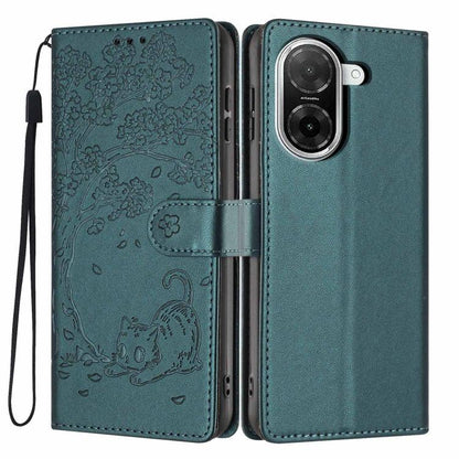 Teal flip phone case with embossed cat scene, card slot, and wrist strap