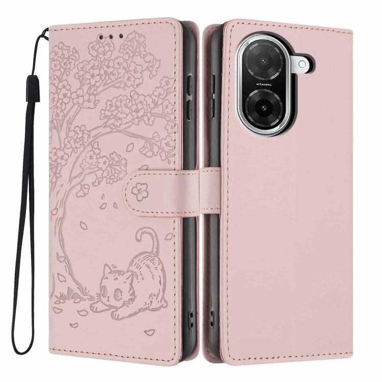 Blush pink flip phone case with embossed cat and tree scene, wrist strap, card holder panel.