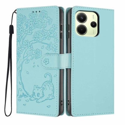 Light aqua embossed cat flip phone case with wrist strap and dual camera cutouts