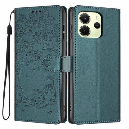 Teal green embossed cat flip phone case with wrist strap and dual camera cutouts