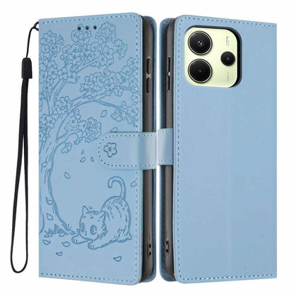 Light blue embossed cat flip phone case with wrist strap and dual camera cutouts