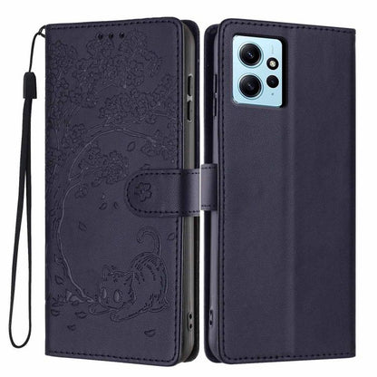 Tree cat embossed flip phone case in dark purple, with wrist strap and camera cutout