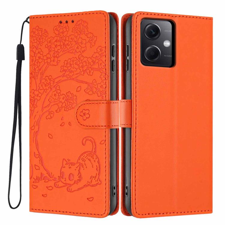Orange embossed flip phone case with cat pattern and wrist strap