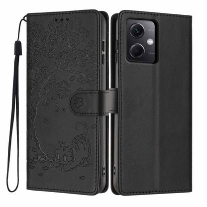 Black cat-embossed flip phone case with wrist strap and cutout for camera