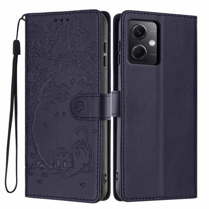 Deep blue embossed flip phone case with cat pattern and wrist strap