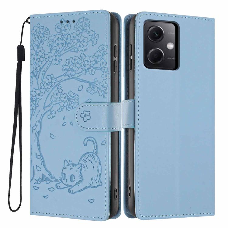 Tree-cat embossed vegan leather flip phone case with wrist strap, light blue.