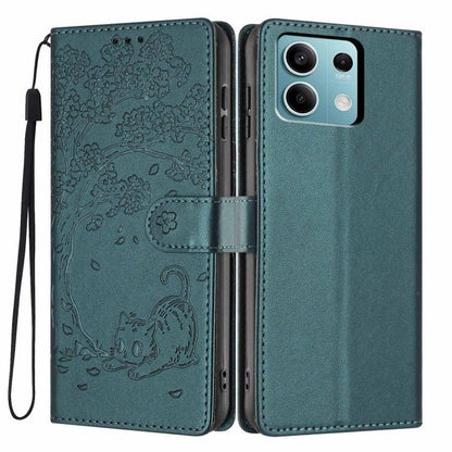 Deep green embossed flip vegan leather phone case with cat motif and wrist strap