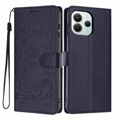 Dark navy flip phone case with embossed cat and tree pattern, wrist strap included