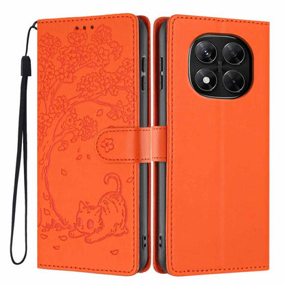 Orange flip phone case with embossed cat and tree pattern, wrist strap included
