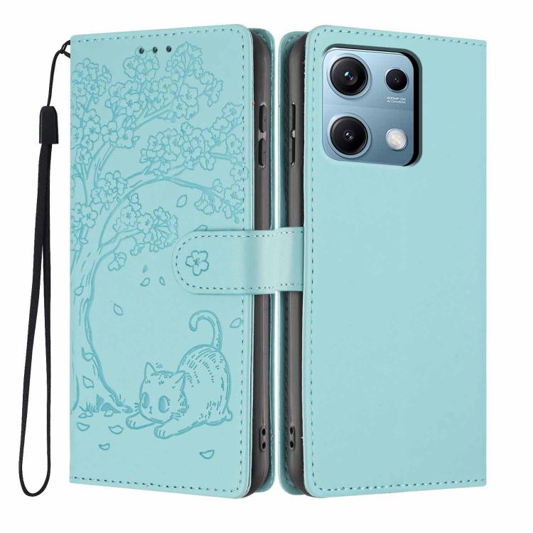 Light blue flip phone case with embossed cat scene, card slot, and wrist strap