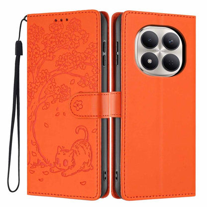 Orange vegan leather flip phone case with embossed tree cat design and wrist strap