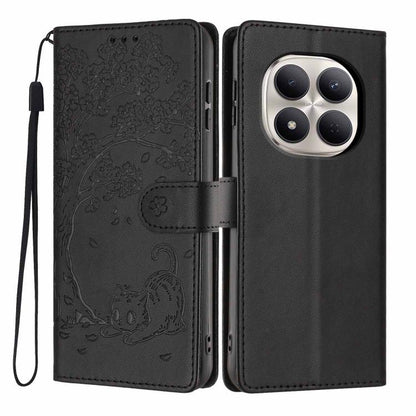 Black vegan leather flip phone case with embossed tree cat design and wrist strap