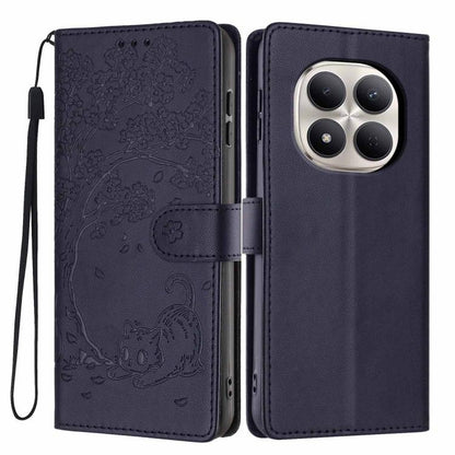 Dark blue vegan leather flip phone case with embossed tree cat design and wrist strap