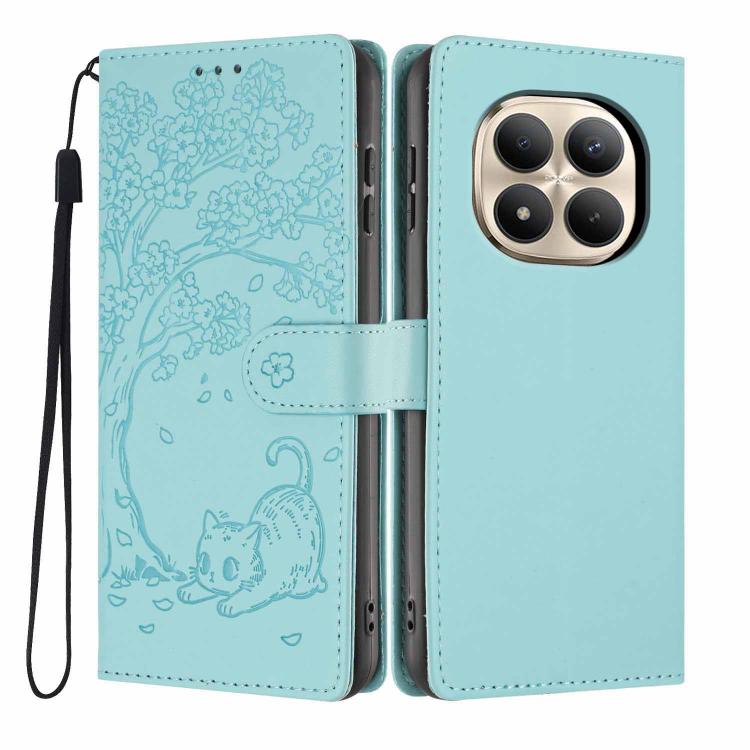 Light blue embossed flip phone case with tree-and-cat pattern, wrist strap, and camera cutout