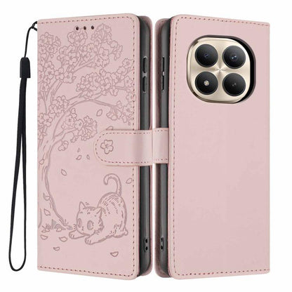 Rose pink embossed flip phone case with tree-and-cat pattern, wrist strap, and camera cutout