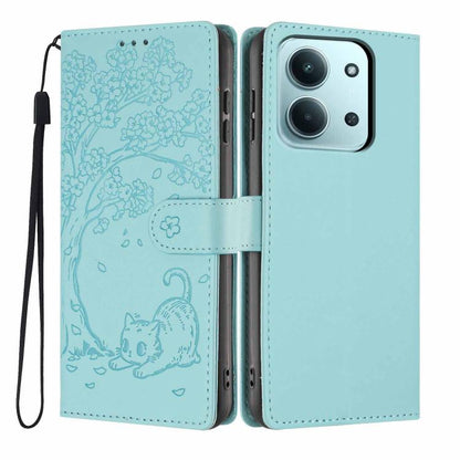 Aqua embossed tree-and-cat flip phone case with vegan leather and wrist strap