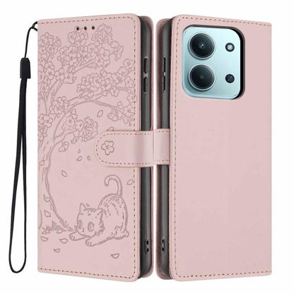 Pink embossed tree-and-cat flip phone case with vegan leather and wrist strap