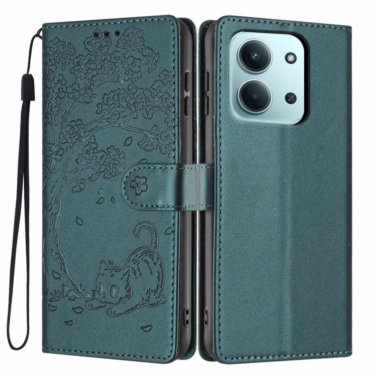 Teal embossed flip phone case with tree-and-cat motif, vegan leather, wrist strap