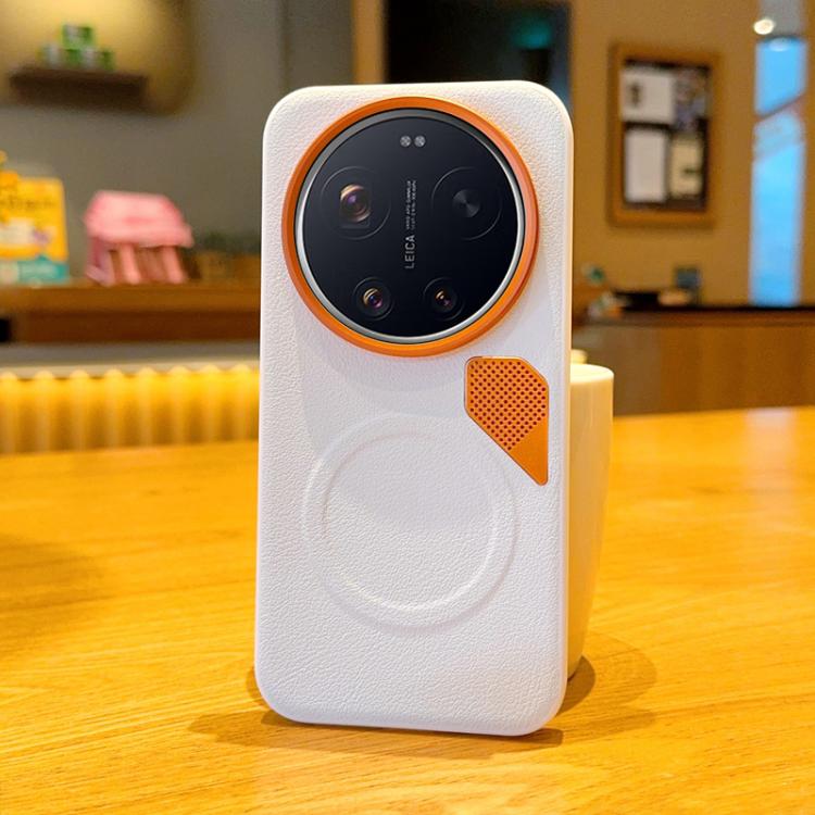 White MagSafe phone case with orange camera ring and vented leather-look panel
