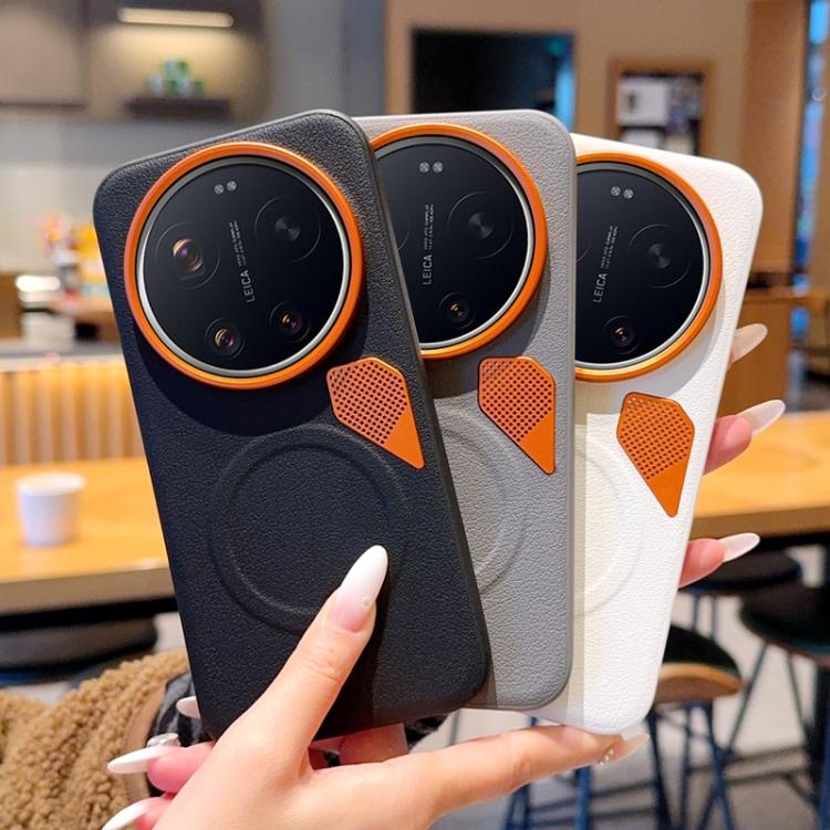 MagSafe phone cases in navy and white with orange camera rings and cooling mesh