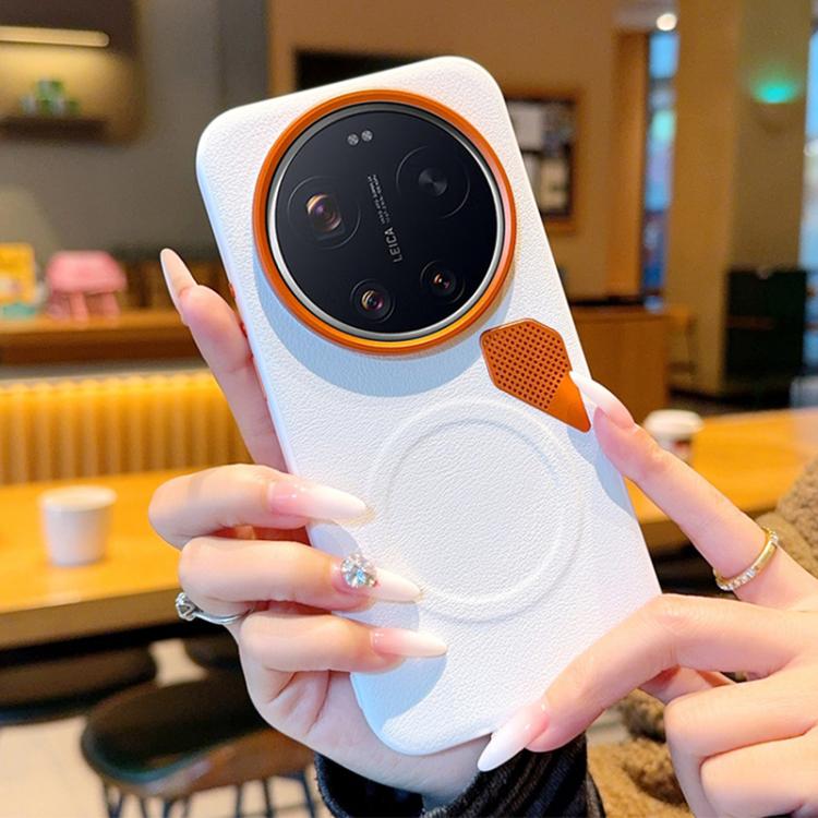 White MagSafe phone case with orange camera ring, textured back, and cooling vents