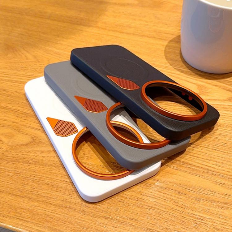 Stacked MagSafe phone cases: white, gray, and navy with orange camera-ring accents