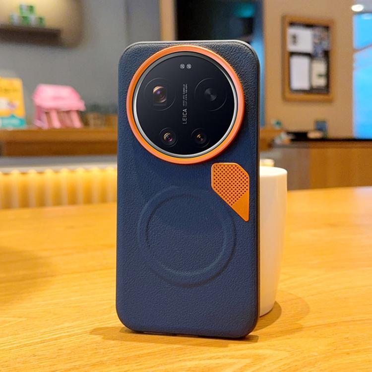Navy MagSafe phone case with orange camera ring and vented leather-look patch
