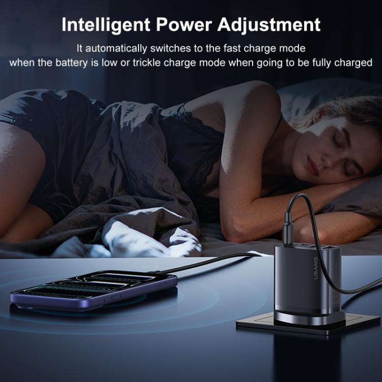 Black GaN fast charger on a base with cable plugged in
