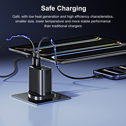 Black 4-port GaN fast charger on stand with connected charging cables