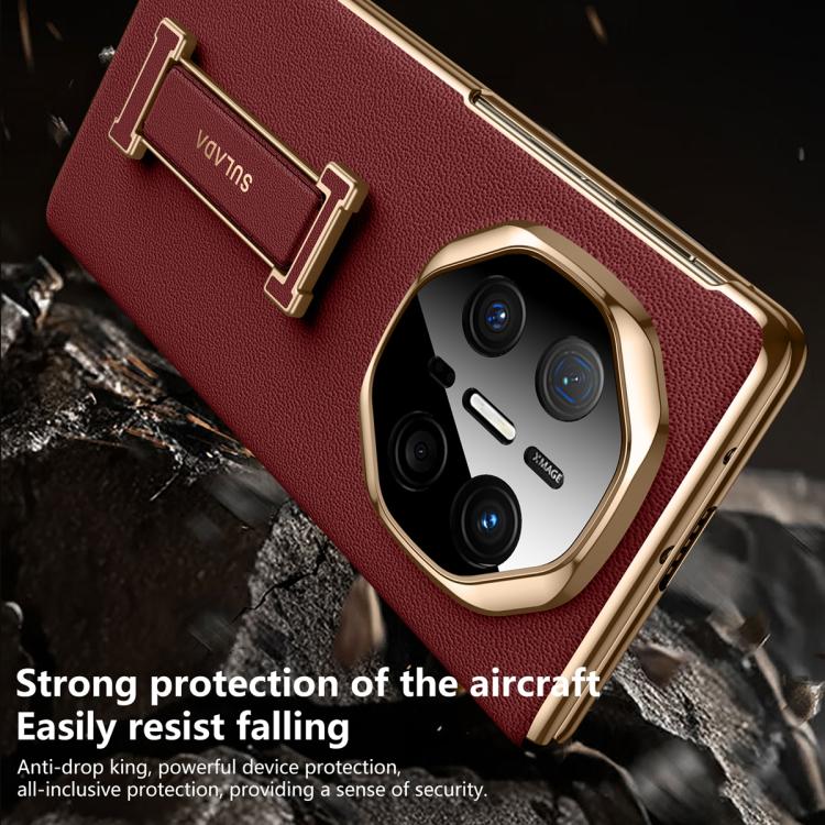 Burgundy genuine leather phone case with wrist strap and gold-tone camera surround