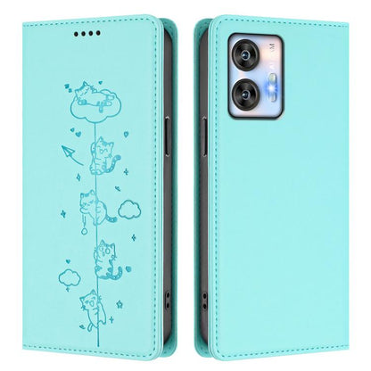 Mint green folio phone case with embossed cats and magnetic closure