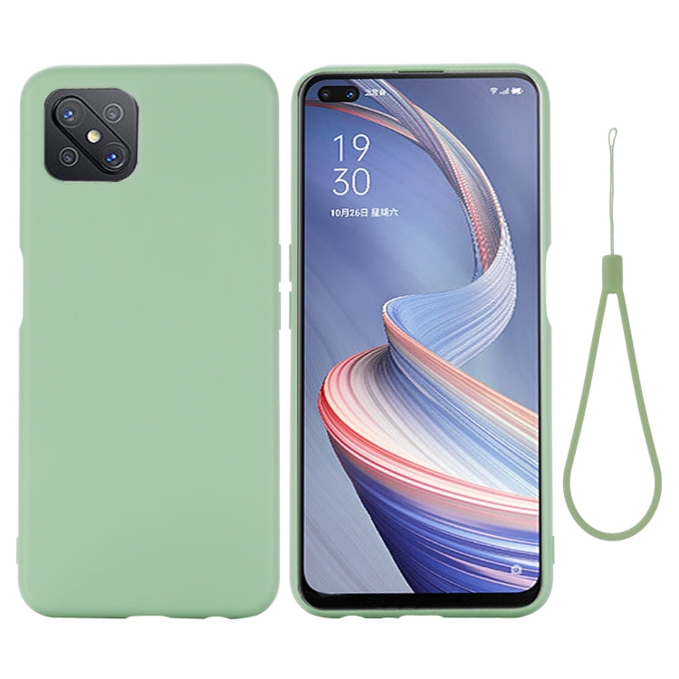 Green full-coverage liquid silicone phone case with lanyard, camera cutouts and raised edges