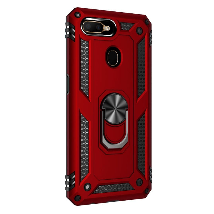 Red rugged phone case with rotating ring holder, textured grip sides, and camera cutout