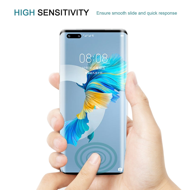 Curved tempered glass screen protector on phone, shown with responsive touch area