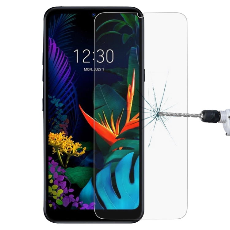 9H tempered glass screen protector for LG smartphone, cracked screen visible behind