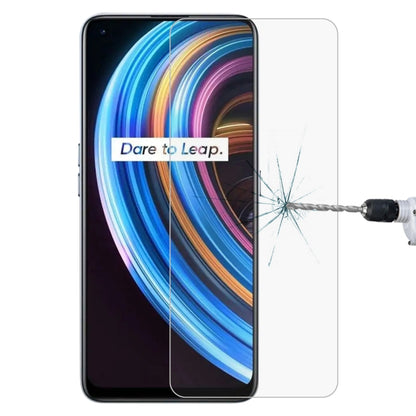 Clear tempered glass screen protector over dark smartphone screen with impact cracks