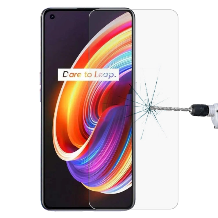 Clear tempered glass screen protector over colorful smartphone screen with impact cracks