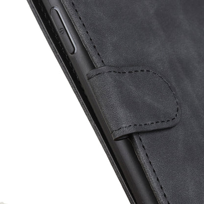 Close-up of black wallet case stitching and front card pocket
