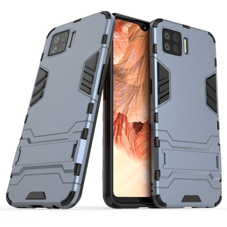 Navy blue shockproof phone case with invisible holder, rugged armor design, dual-layer protection.