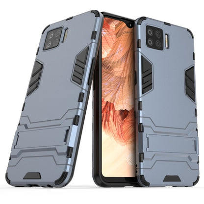 Navy blue shockproof phone case with invisible holder, rugged armor design, dual-layer protection.