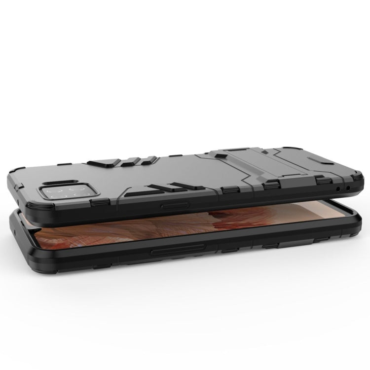 Navy blue shockproof phone case with invisible holder, kickstand support and textured grip edges.