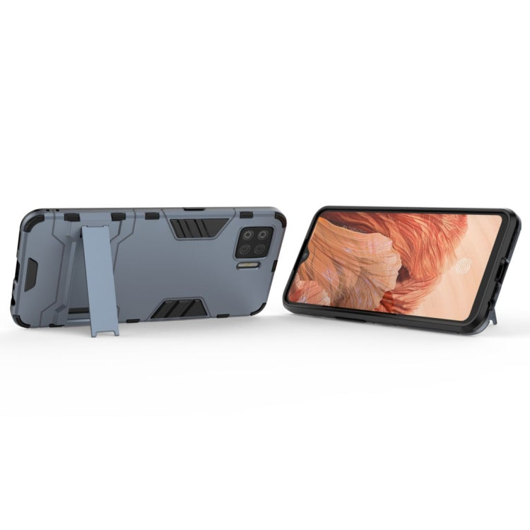 Navy blue shockproof phone case with invisible holder, side kickstand support extended.