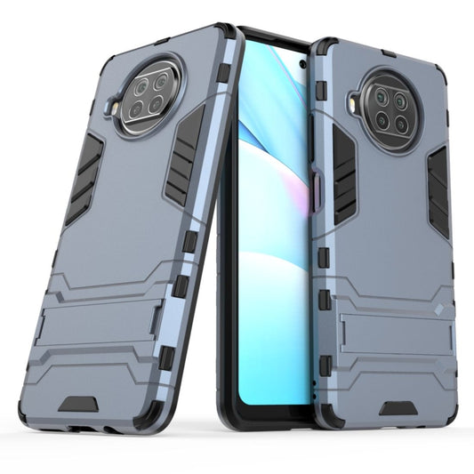 Navy blue shockproof phone case with raised edges and triple-camera cutout