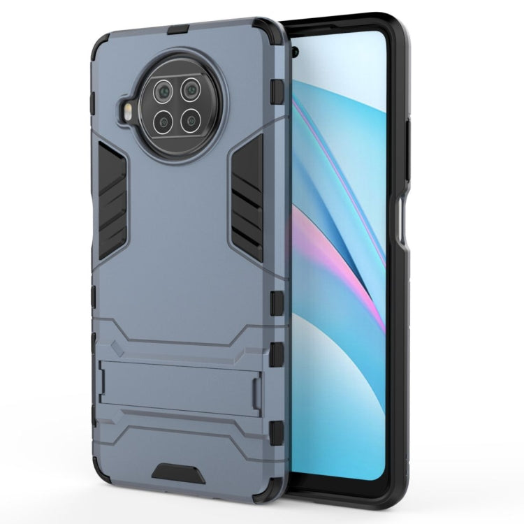 Navy blue protective phone case with textured grip details and camera cutouts