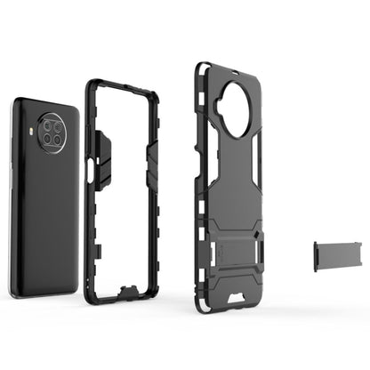 Black rugged phone case with camera cutout and detachable side bumper pieces