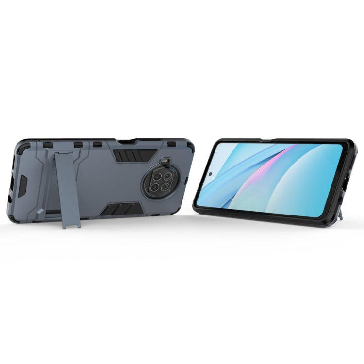 Navy blue rugged phone case with kickstand-like fold and screen-facing cutouts